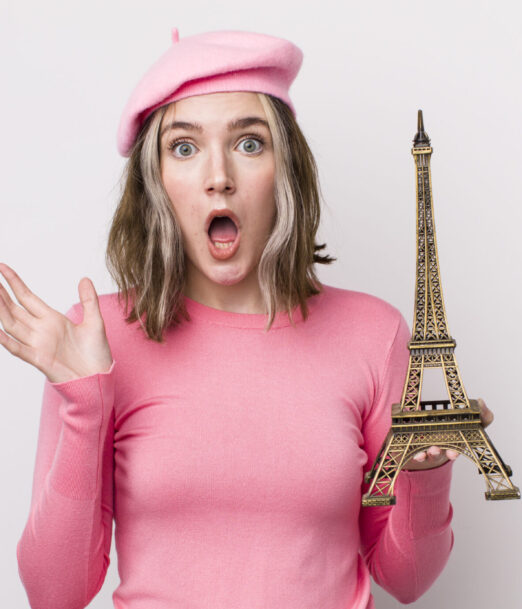 pretty caucasian woman amazed, shocked and astonished with an unbelievable surprise. france concept